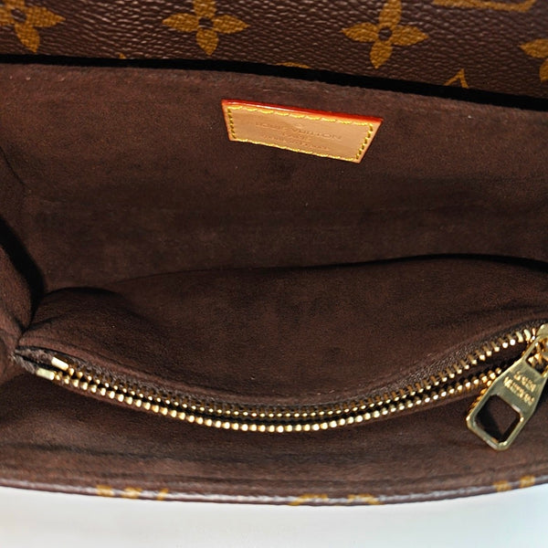 MÉTIS EAST WEST Monogram Coated Canvas Brown