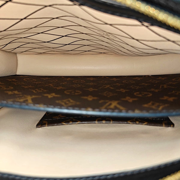 TRUNK Monogram Coated Canvas Brown