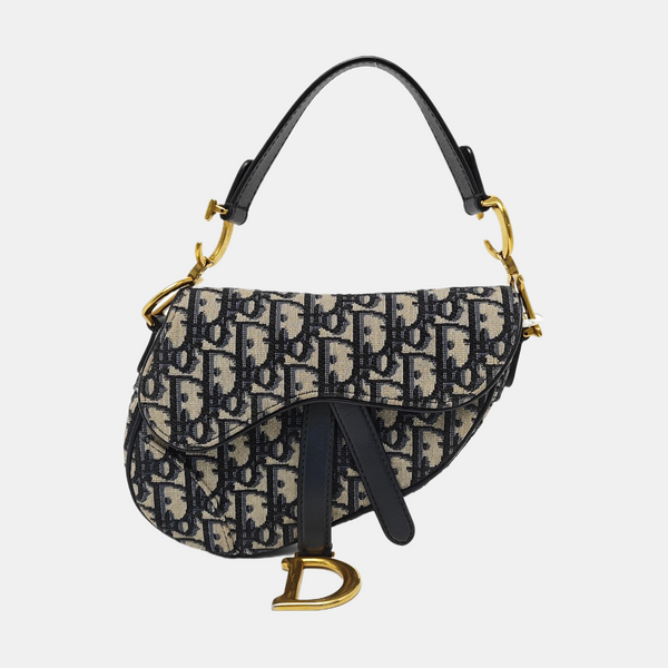 Authenticated pre-owned Saddle Mini Monogram Canvas Blue - Top Handle Bag at Looply