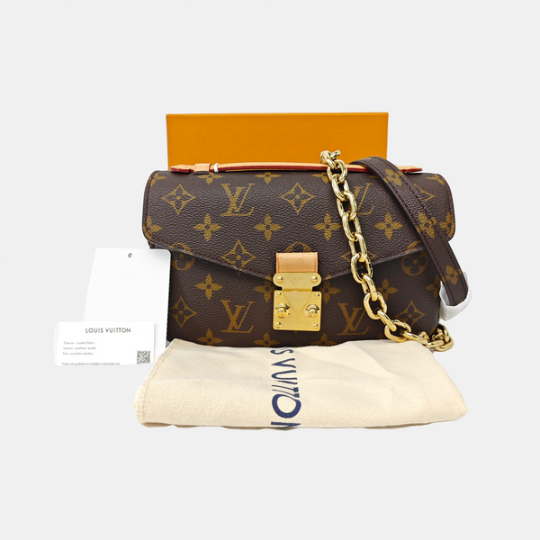 MÉTIS EAST WEST Monogram Coated Canvas Brown