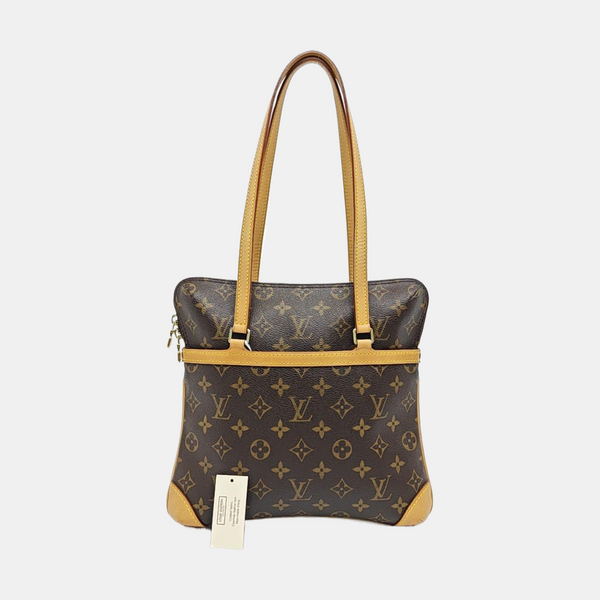 COUSSIN GM Monogram Coated Canvas Brown