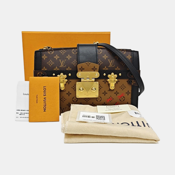 TRUNK Monogram Coated Canvas Brown