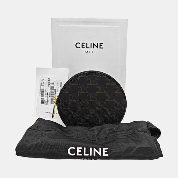 Authenticated pre-owned TRIOMPHE CANVAS Leather Black - Clutch at Looply