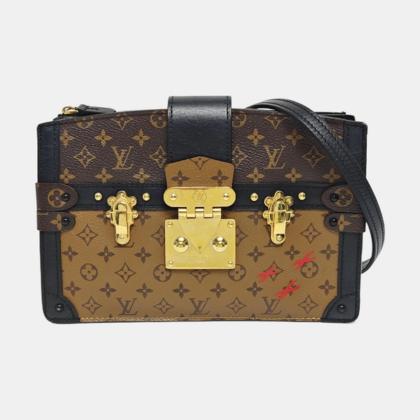 TRUNK Monogram Coated Canvas Brown