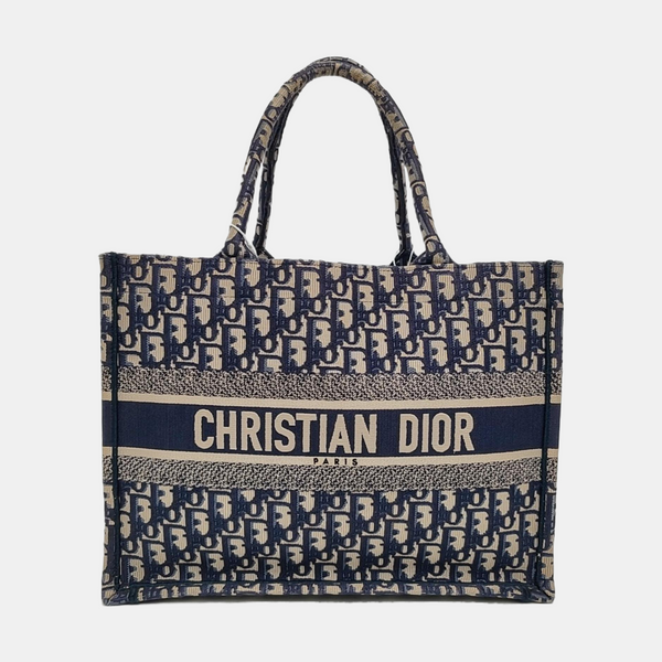 Authenticated pre-owned Book Tote Medium Monogram Canvas Blue - Tote Bag at Looply