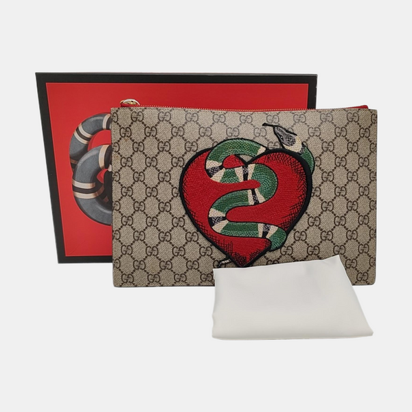 Monogram Coated Canvas Clutch Beige