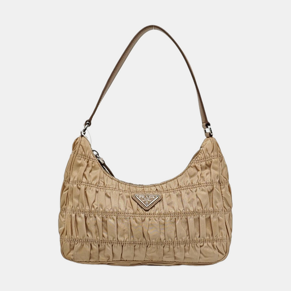 Authenticated pre-owned Re-Edition2005 Mini Quilted Nylon Beige - Top Handle Bag at Looply