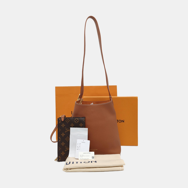 LOW KEY HOBO PM Monogram Calfskin Brown
