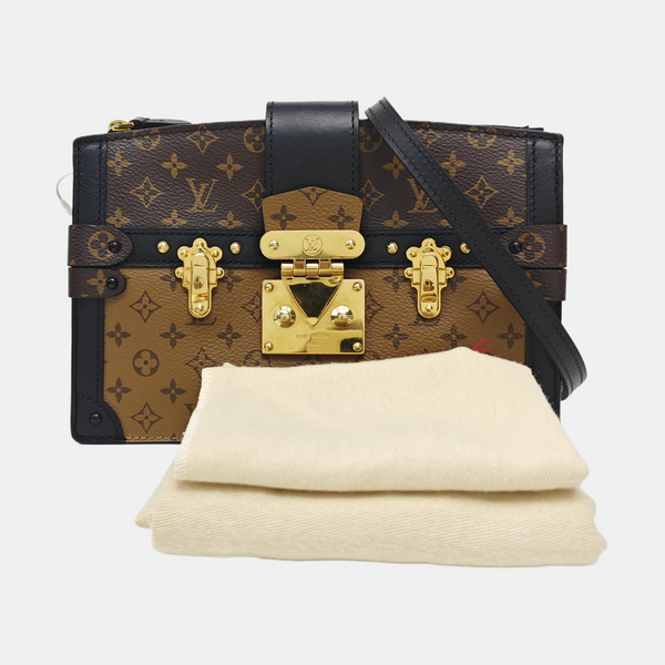 TRUNK Monogram Coated Canvas Brown
