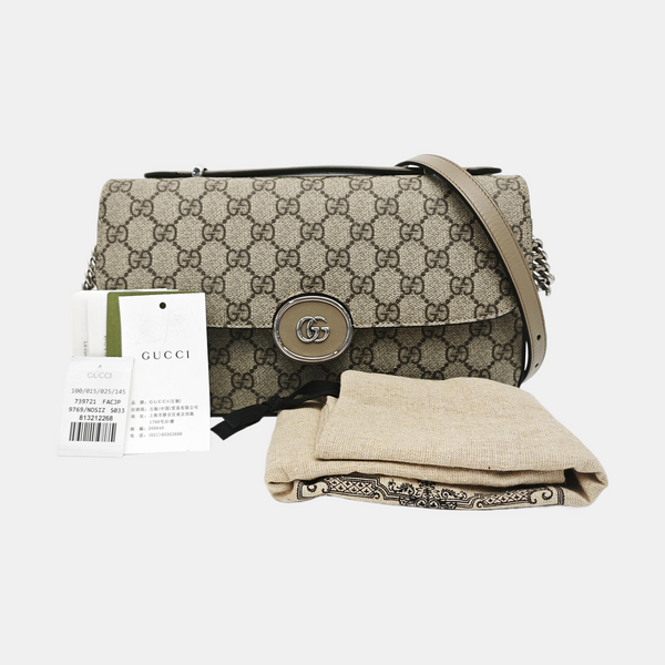 PETITE Small Monogram Coated Canvas Gray