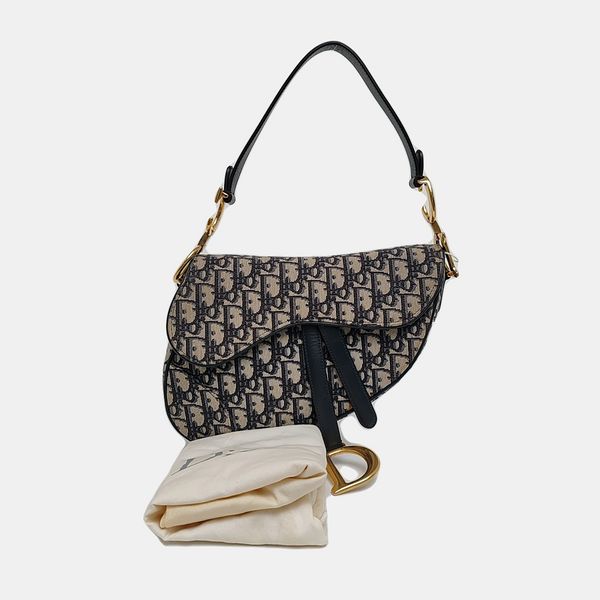 Authenticated pre-owned Saddle Medium Oblique Canvas Blue - Top Handle Bag at Looply