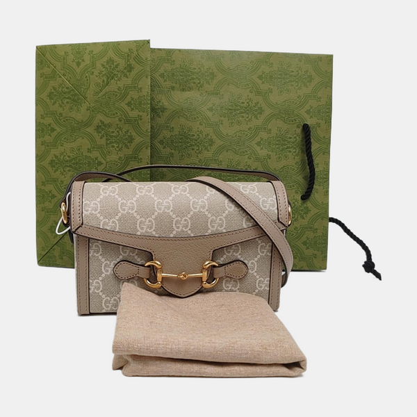 Authenticated pre-owned Horsebit 1955 Mini Monogram Coated Canvas White - Shoulder Bag at Looply
