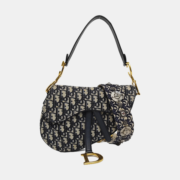 Authenticated pre-owned Saddle Medium Monogram Canvas Blue - Shoulder Bag at Looply