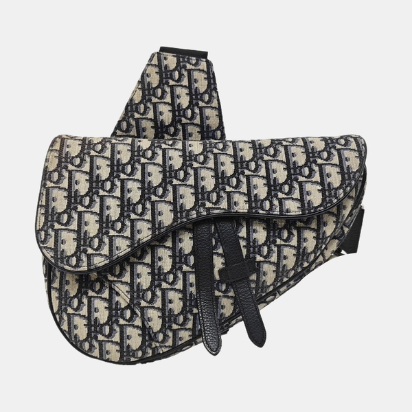 Authenticated pre-owned Saddle Medium Monogram Canvas Beige - Crossbody Bag at Looply