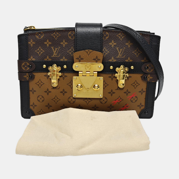 TRUNK Monogram Coated Canvas Brown