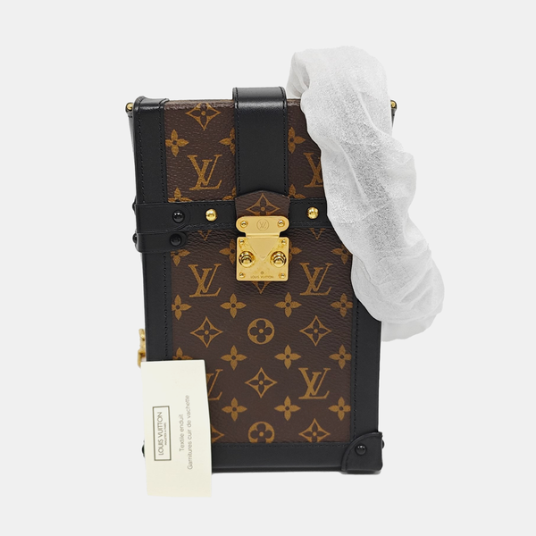 TRUNK Monogram Coated Canvas Brown