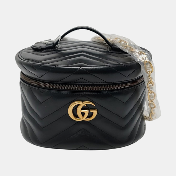 Authenticated pre-owned GG Marmont Small Quilted Calfskin Black - Top Handle Bag at Looply