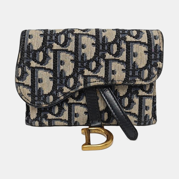 Authenticated pre-owned Saddle Oblique Canvas Blue - Clutch at Looply