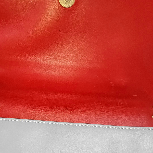 Authenticated pre-owned Rockstud Calfskin Blue - Clutch at Looply