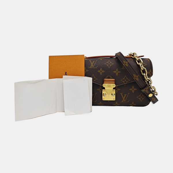 MÉTIS EAST WEST Monogram Coated Canvas Brown