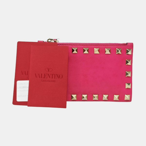 Authenticated pre-owned Rockstud Calfskin Pink - Clutch at Looply