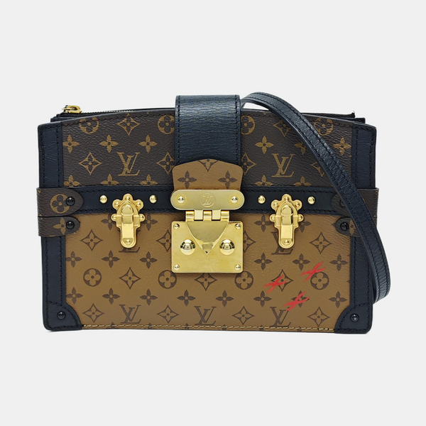TRUNK Monogram Coated Canvas Brown