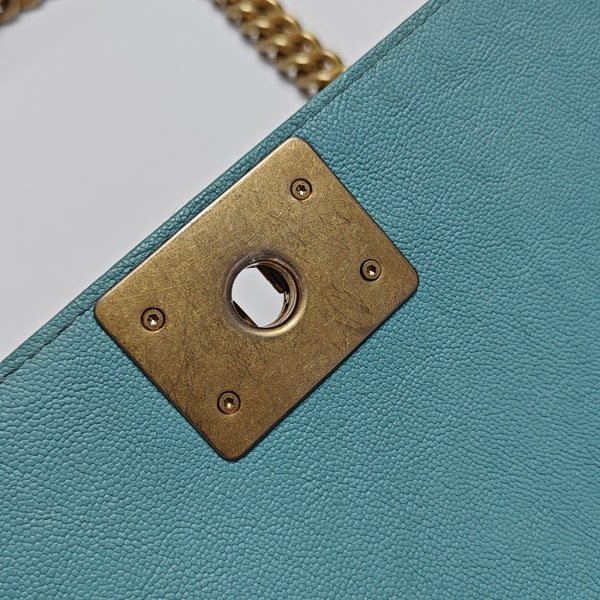 Authenticated pre-owned BOY CHANEL Small Quilted Grained Calfskin Blue - Shoulder Bag at Looply
