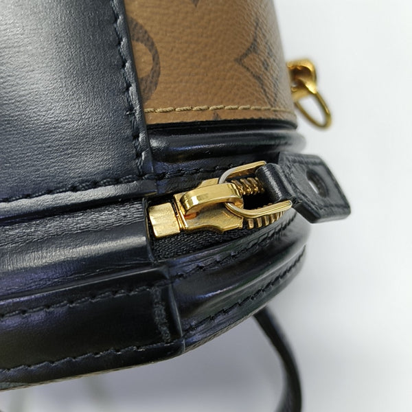 CANNES PM Monogram Coated Canvas Brown