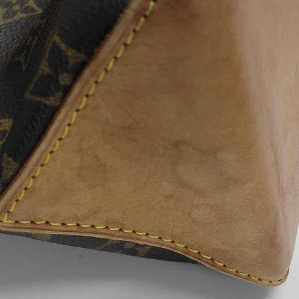 PIANO Monogram Coated Canvas Brown