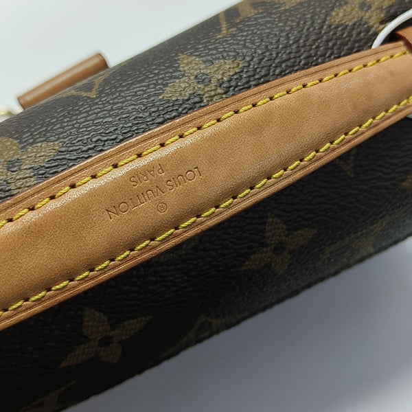 MÉTIS EAST WEST Monogram Coated Canvas Brown