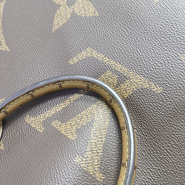 ONTHEGO MM Monogram Coated Canvas Brown