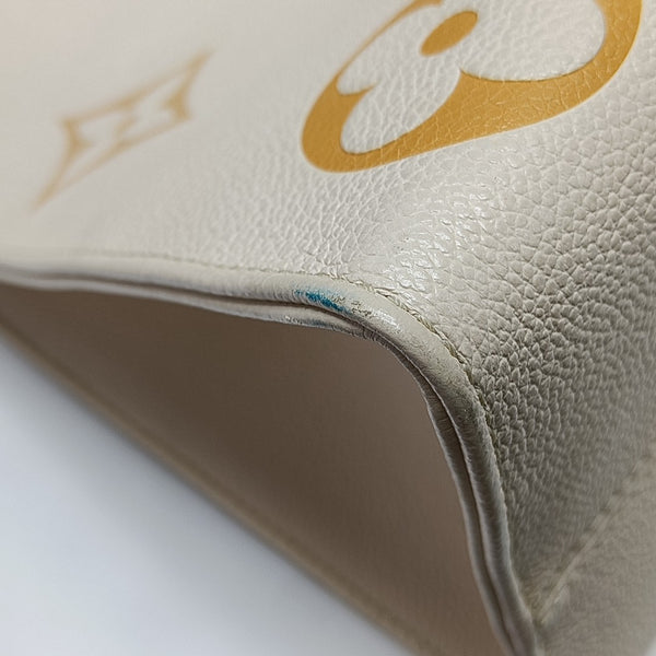 ONTHEGO MM Monogram Calfskin Beige