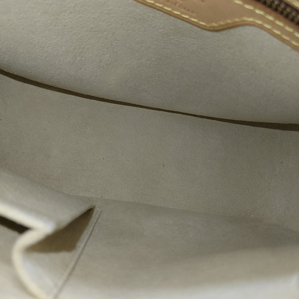 LOOPING MM Monogram Coated Canvas Brown