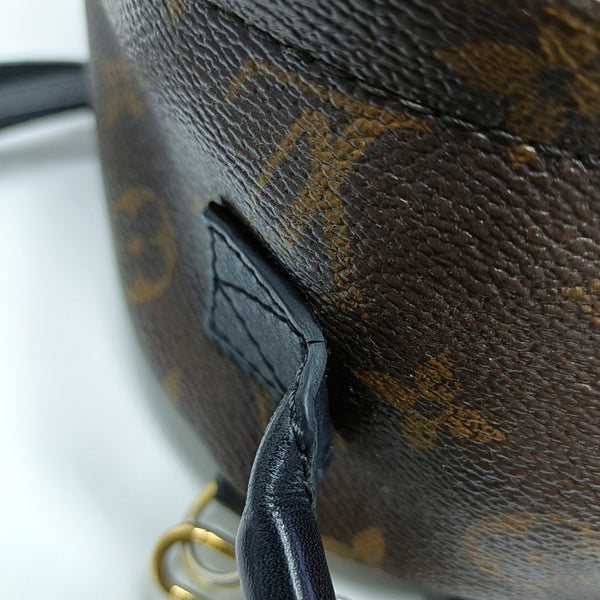 Authenticated pre-owned PALM SPRINGS Mini Monogram Coated Canvas Brown - Backpack at Looply