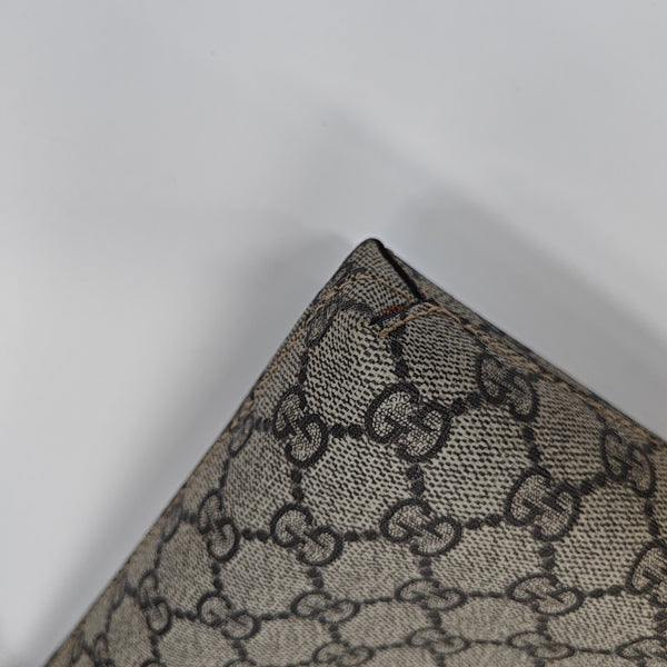 Monogram Coated Canvas Clutch Brown