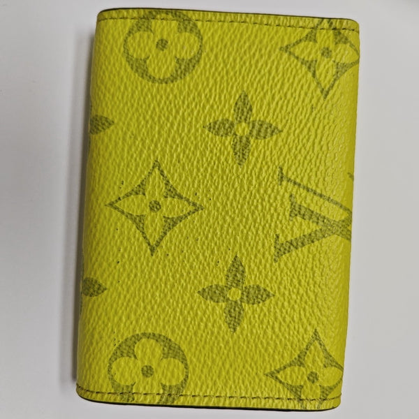 DISCOVERY Monogram Coated Canvas Yellow Card Holder