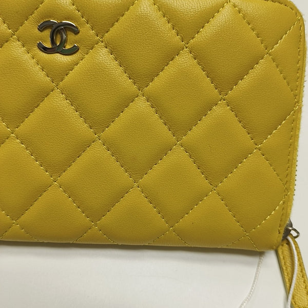 Authenticated pre-owned WOC Quilted Lambskin Yellow Wallet - Wallet at Looply