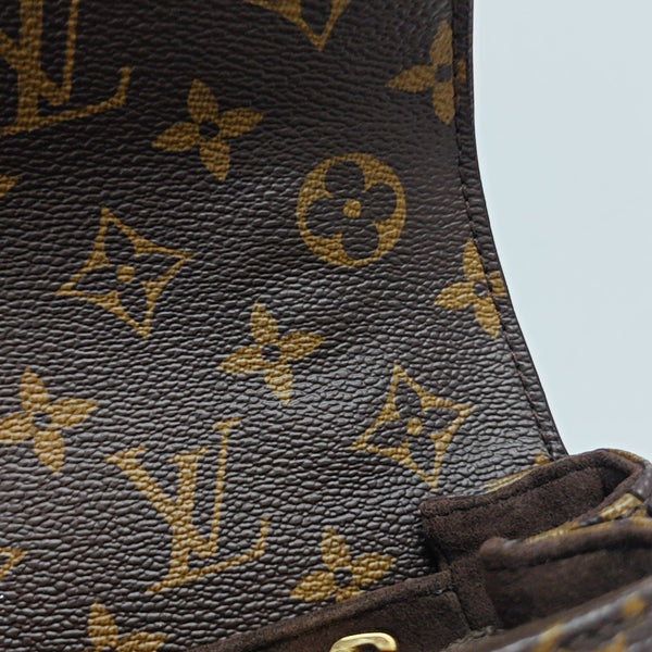 MÉTIS EAST WEST Monogram Coated Canvas Brown