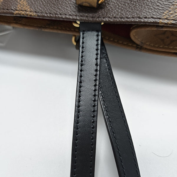 ONTHEGO MM Monogram Coated Canvas Brown