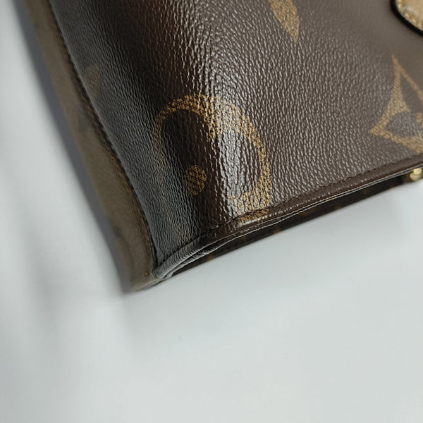 ONTHEGO PM Monogram Coated Canvas Brown