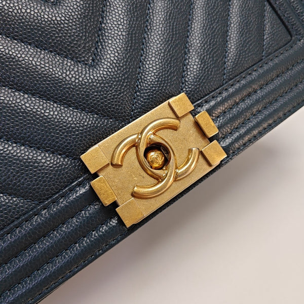 Authenticated pre-owned BOY CHANEL Medium Chevron, Quilted Grained Calfskin Blue - Shoulder Bag at Looply