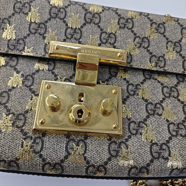 Padlock Small Monogram Coated Canvas Beige