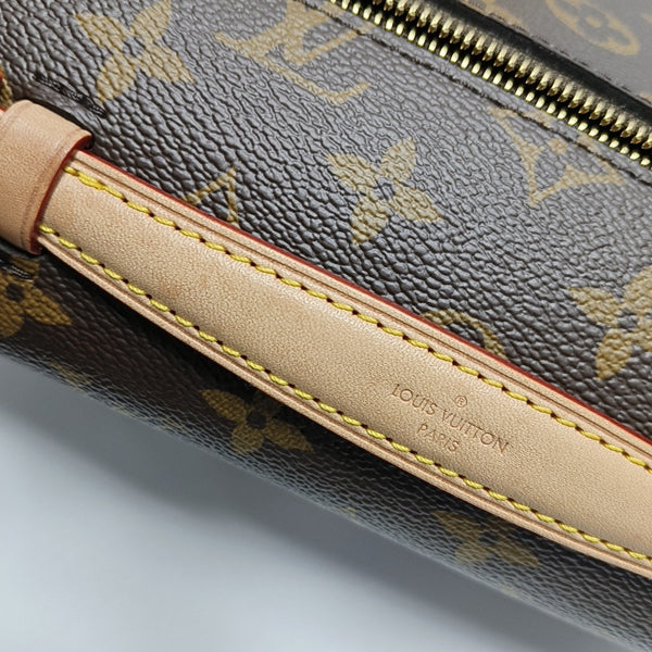 MÉTIS EAST WEST Monogram Coated Canvas Brown