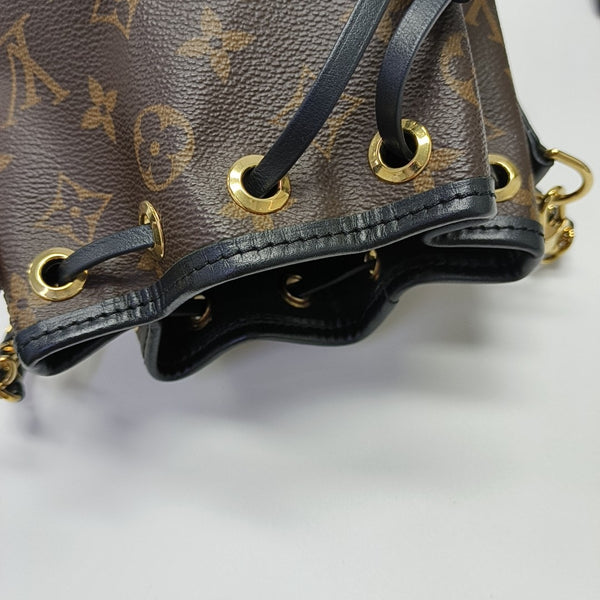 CANOÉ Monogram Coated Canvas Brown