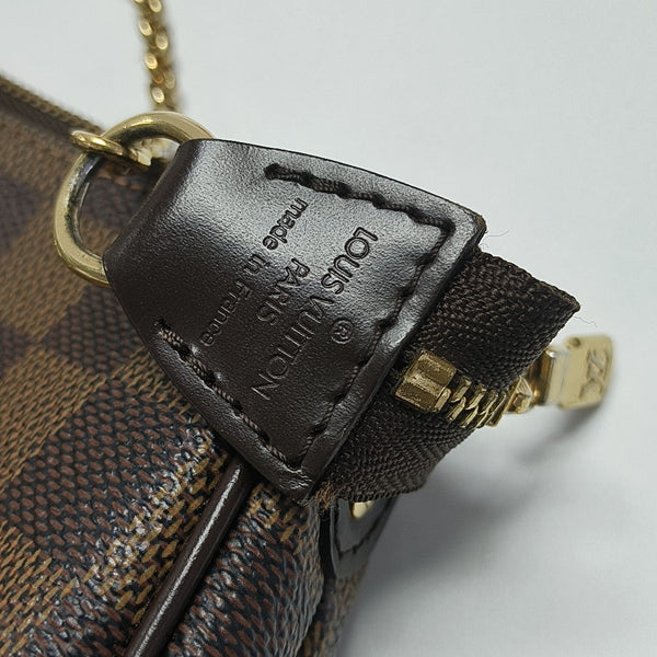 EVA Damier Ebene Coated Canvas Brown