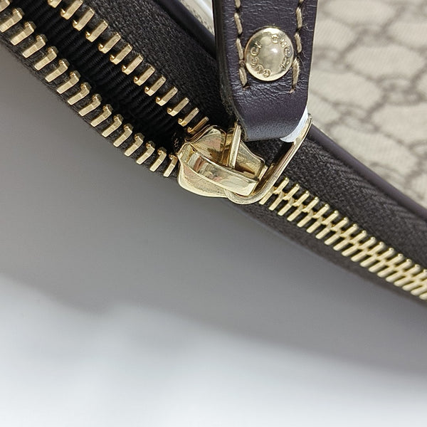 Monogram Coated Canvas Clutch Beige
