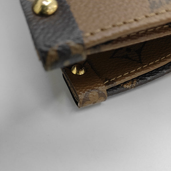 ONTHEGO MM Monogram Coated Canvas Brown
