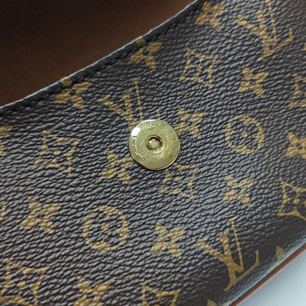 SAUMUR Monogram Coated Canvas Brown