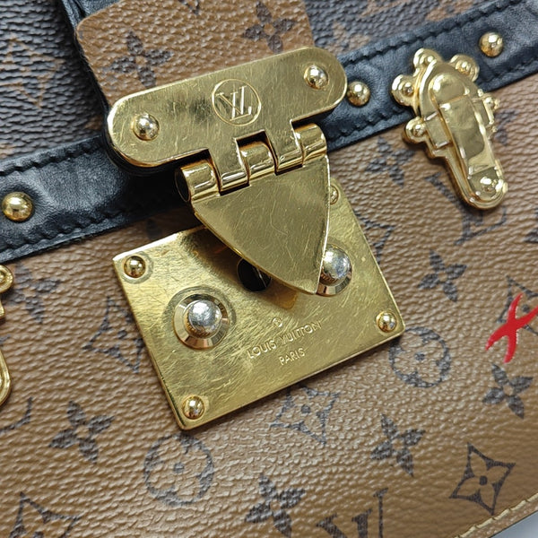 TRUNK Monogram Coated Canvas Brown
