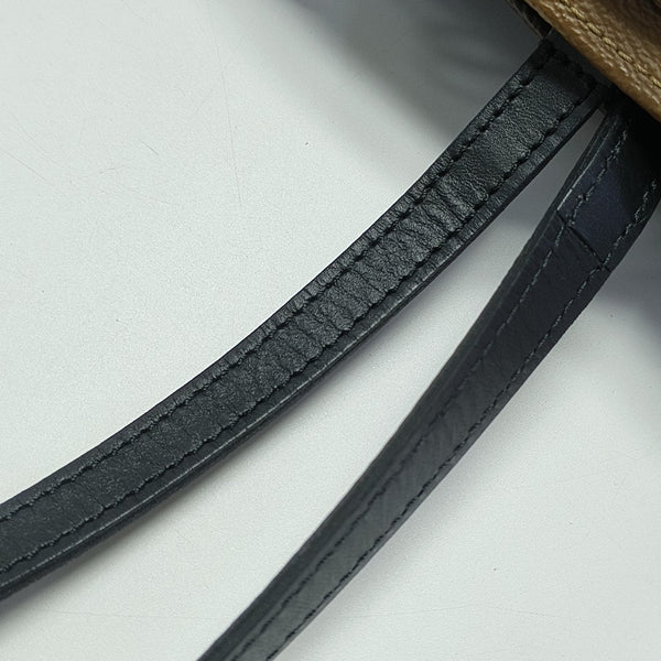 ONTHEGO MM Monogram Coated Canvas Brown